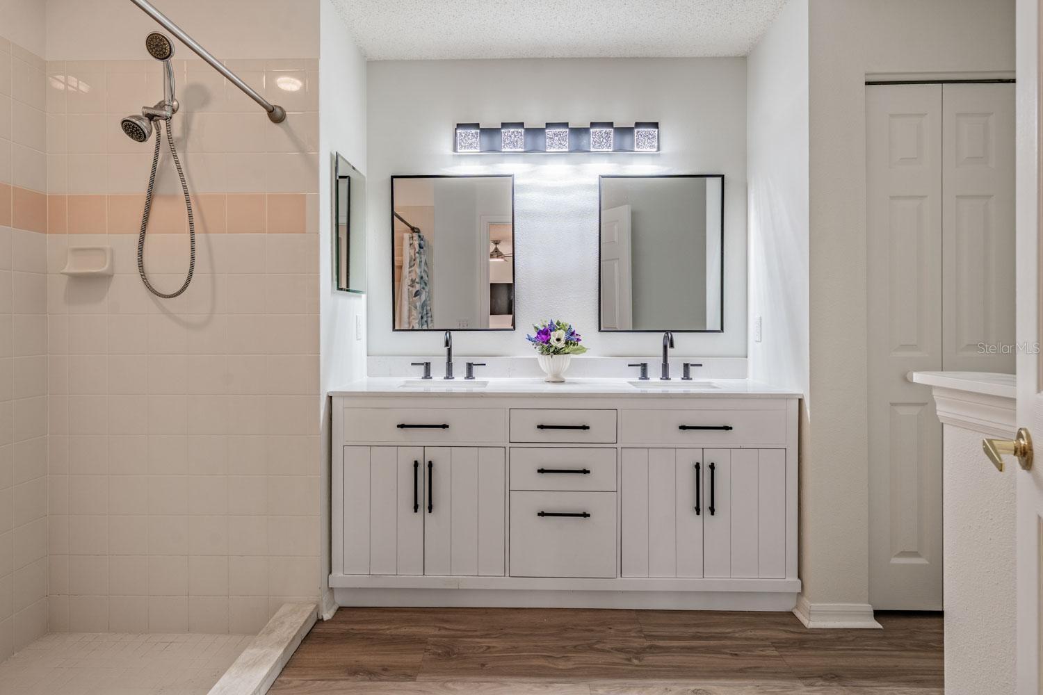 Double vanity with step in shower