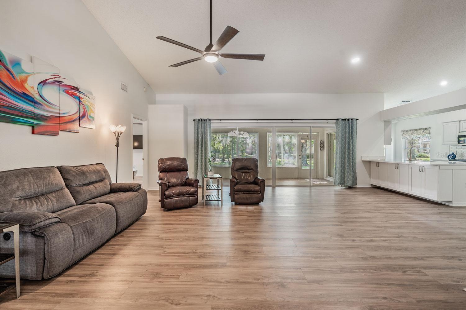 View of Florida room through the oversized sliding glass doors