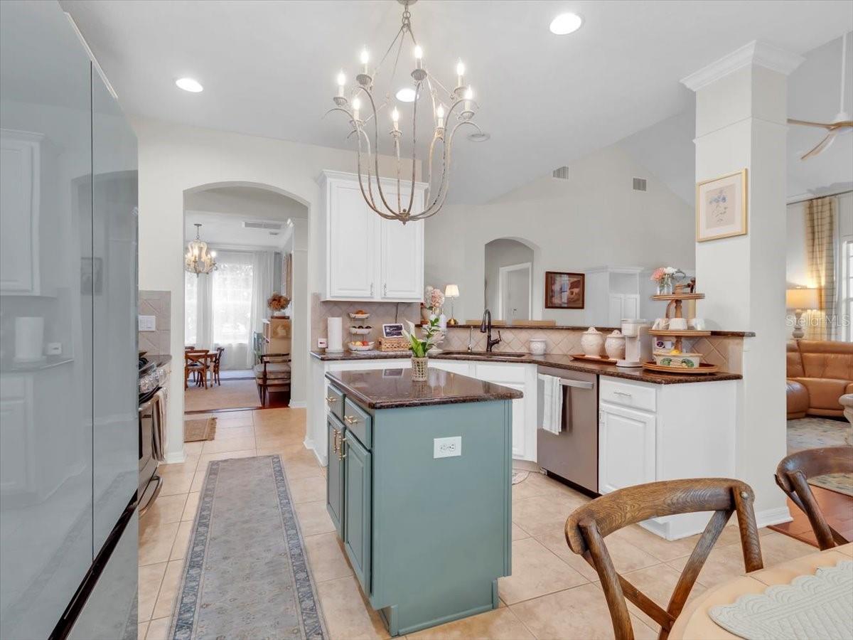 This view shows the architectural style of the arches and open concept layout.