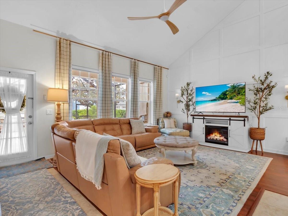 Cozy Family room just off the kitchen. Vaulted Ceilings showcase the rooms character!
