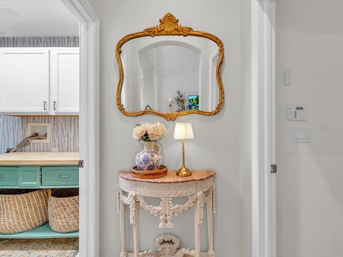 Hall entry to Laundry Room and Primary Bedroom.