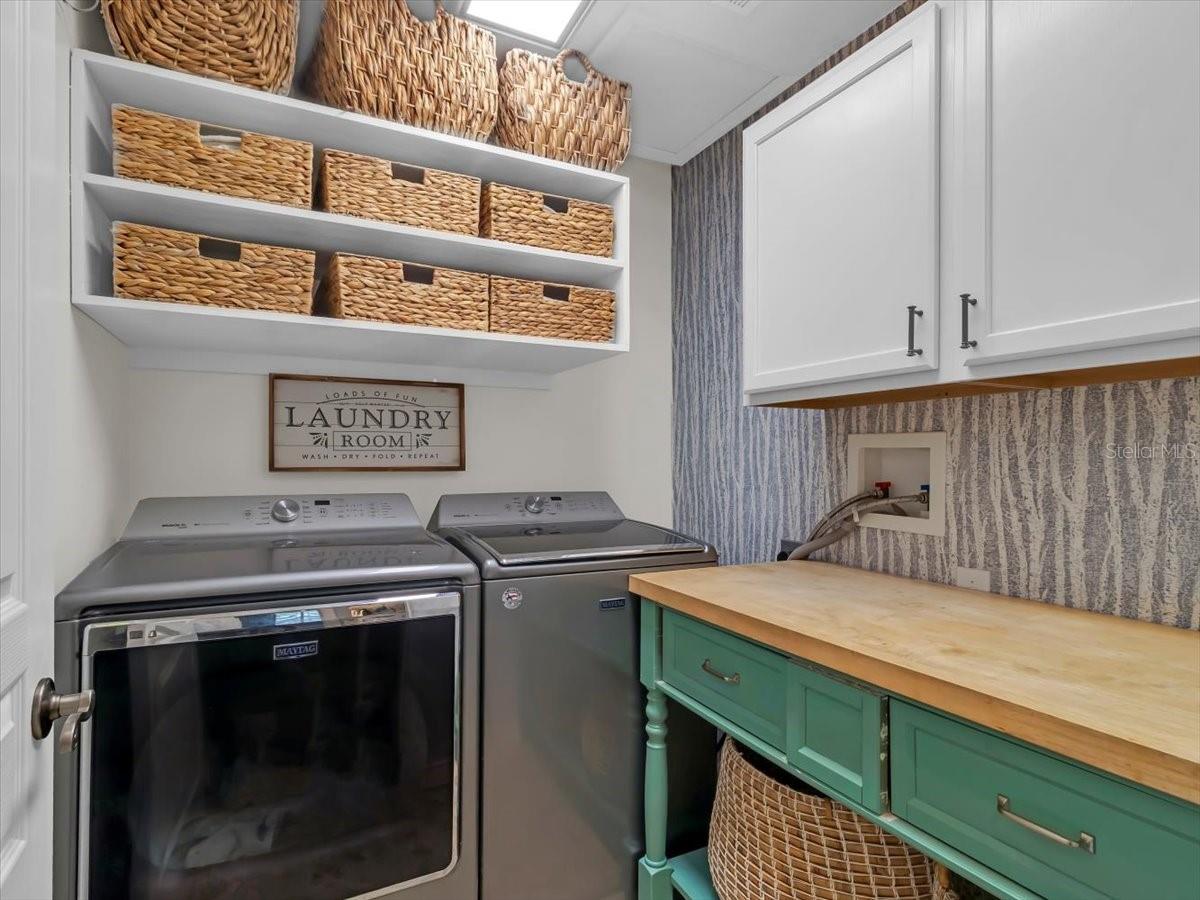 Laundry features INCLUDED Washer &Gas Dryer & Storage Galore!