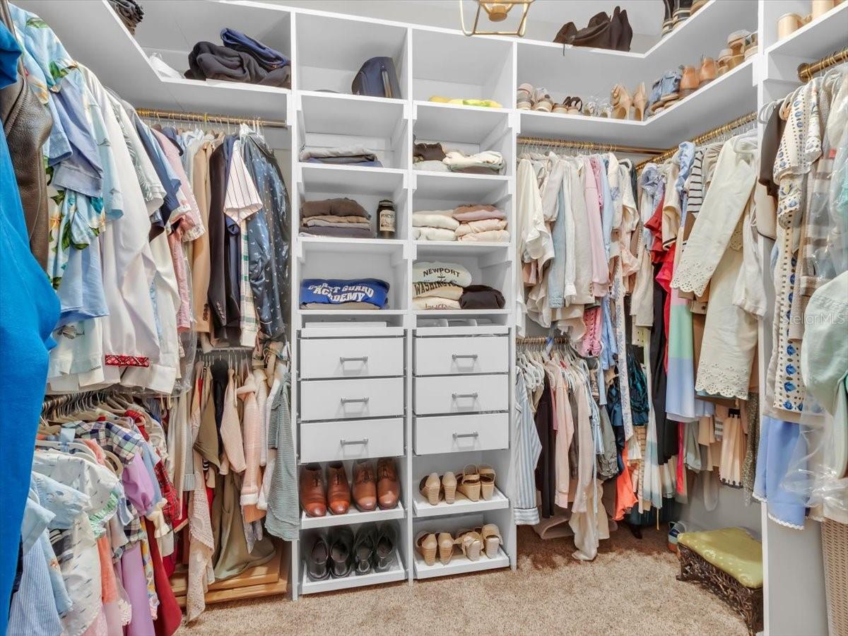 Primary Walk in Clothing closet, with BUILT IN STORAGE GALORE!!!