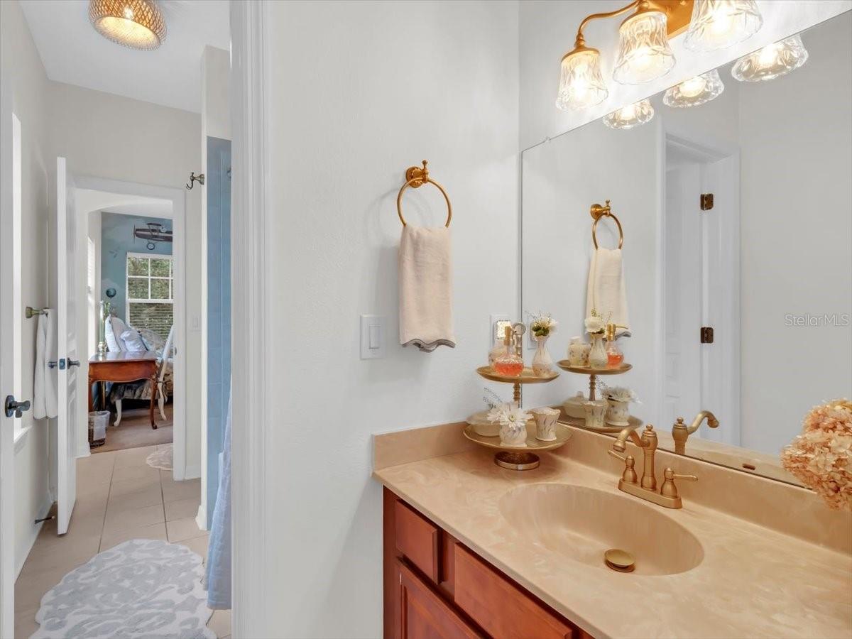 Jack n Jill Vanity area Bedroom 2, Features Quality updated faucets & lighting!