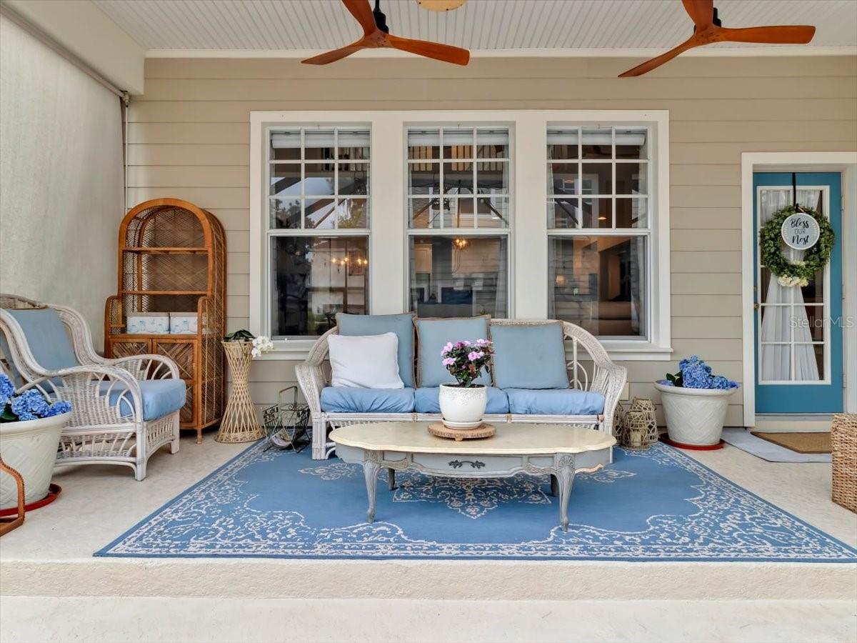 View of the Covered lanai- Elevated area with 2 ceiling fans for keeping it cool!