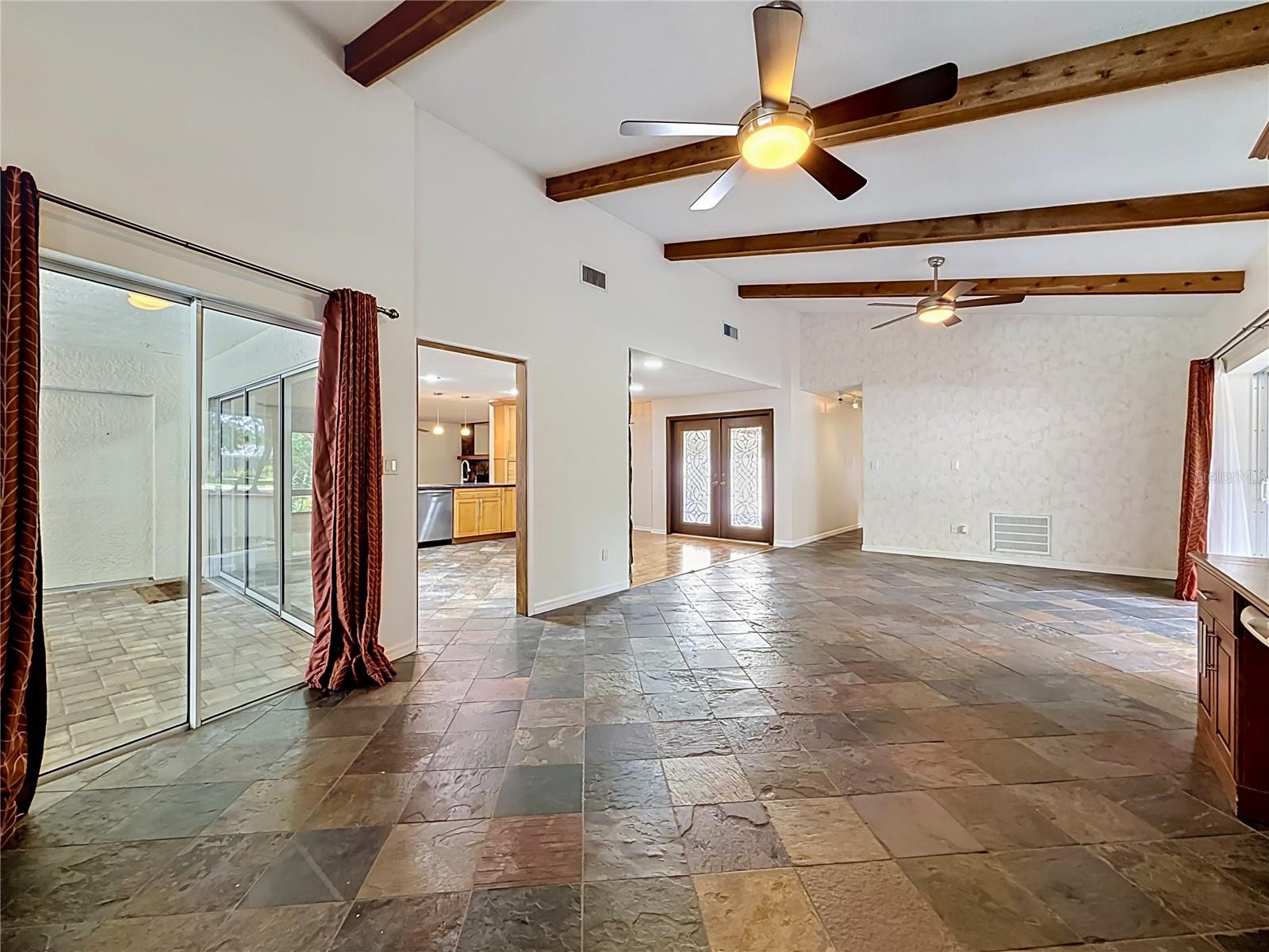 Living Room - Dining Room - Kitchen - Sliding Doors to Outside Living Space
