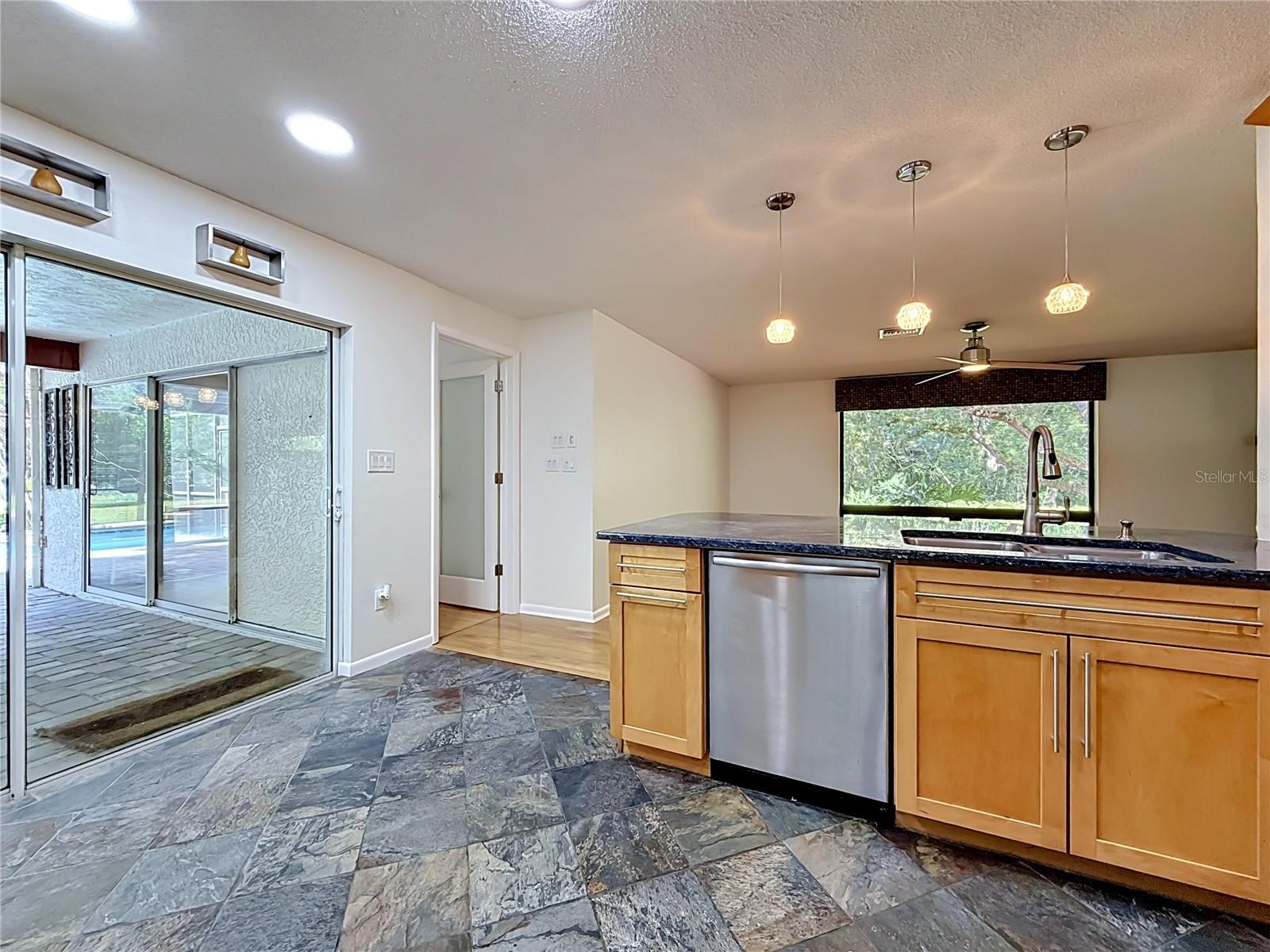 Kitchen - Sliding Doors to Outdoor Living Space