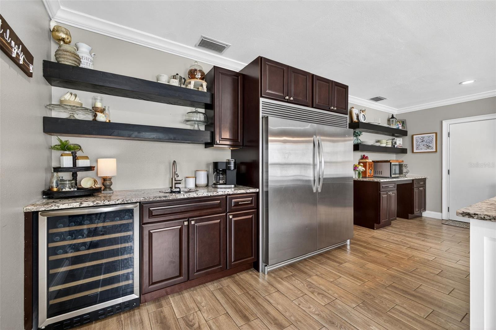 Beverage fridge and wet bar nook in kitchen