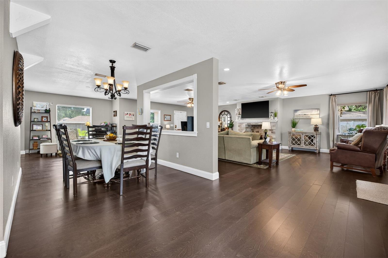 Dining room off living room and steps to kitchen
