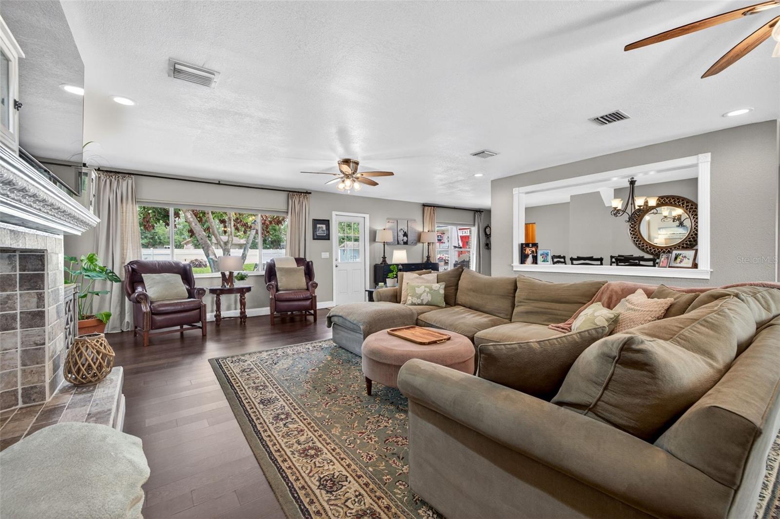 Oversized living room with decorative fireplace