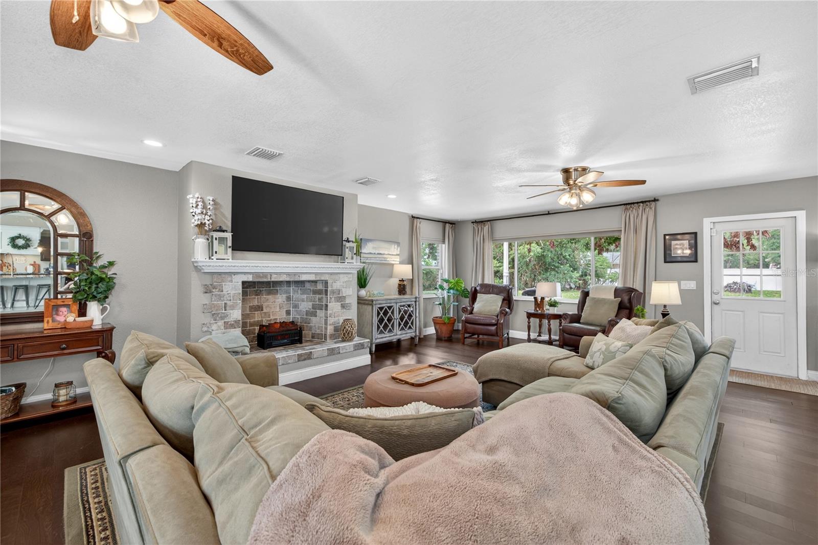 Oversized living room with decorative fireplace