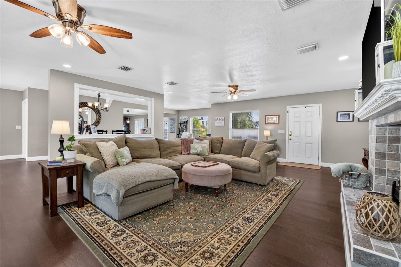 Oversized living room with decorative fireplace