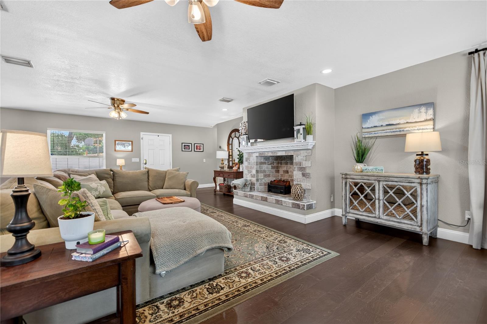 Oversized living room with decorative fireplace