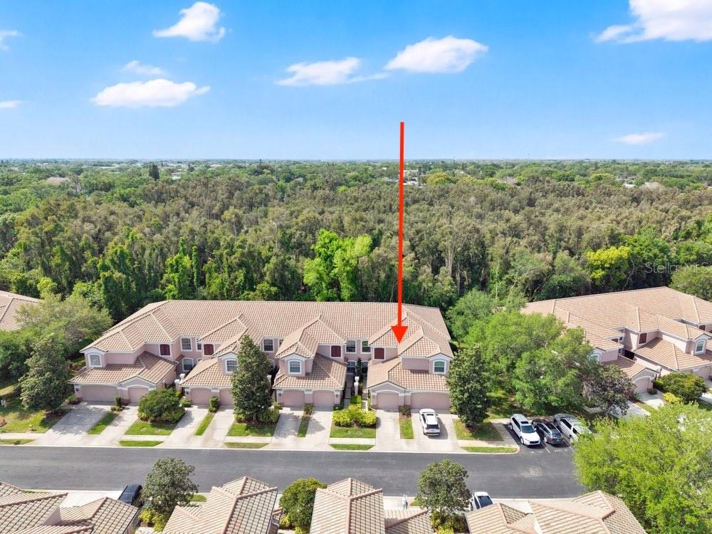 Ground floor end unit prime location backs to conservation for ultimate peace, quiet, and privacy!