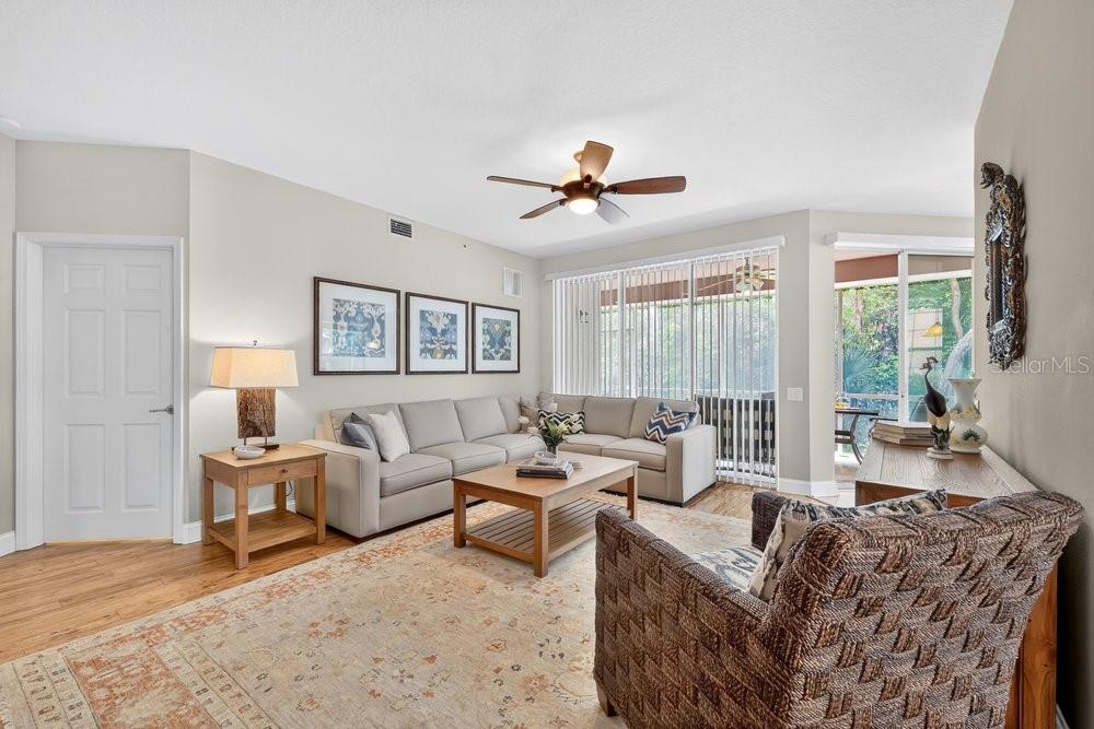 Living area with primary door and lanai entrance