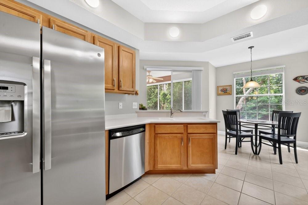 Kitchen w dinette bathed in natural light