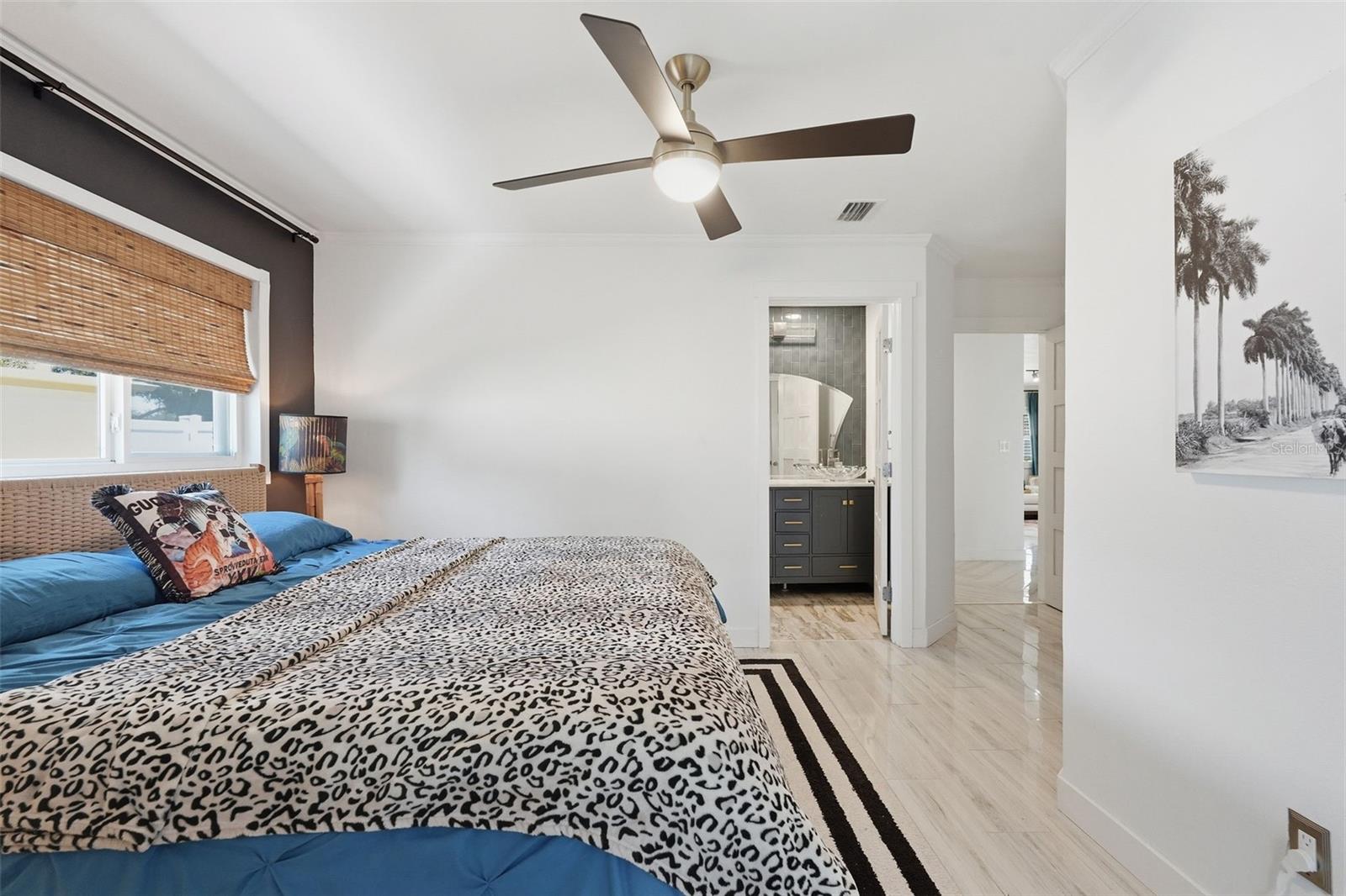 The oversized owner’s suite features an en suite bath, walk-in cedar closet, and expanded flex space perfect for a lounge, office, dressing room, or private retreat.