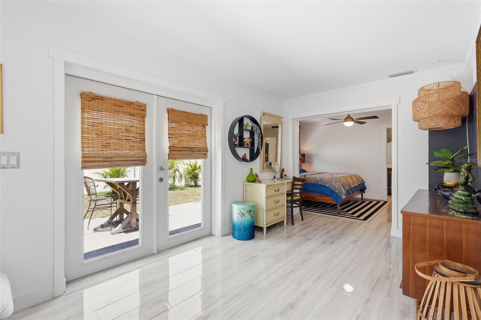 The oversized owner’s suite features an en suite bath, walk-in cedar closet, and expanded flex space perfect for a lounge, office, dressing room, or private retreat.
