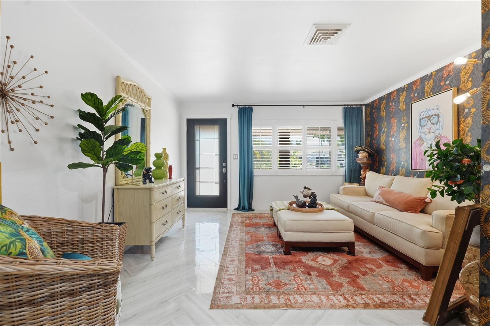Forget beige and boring — this formal living room is a conversation piece all its own.