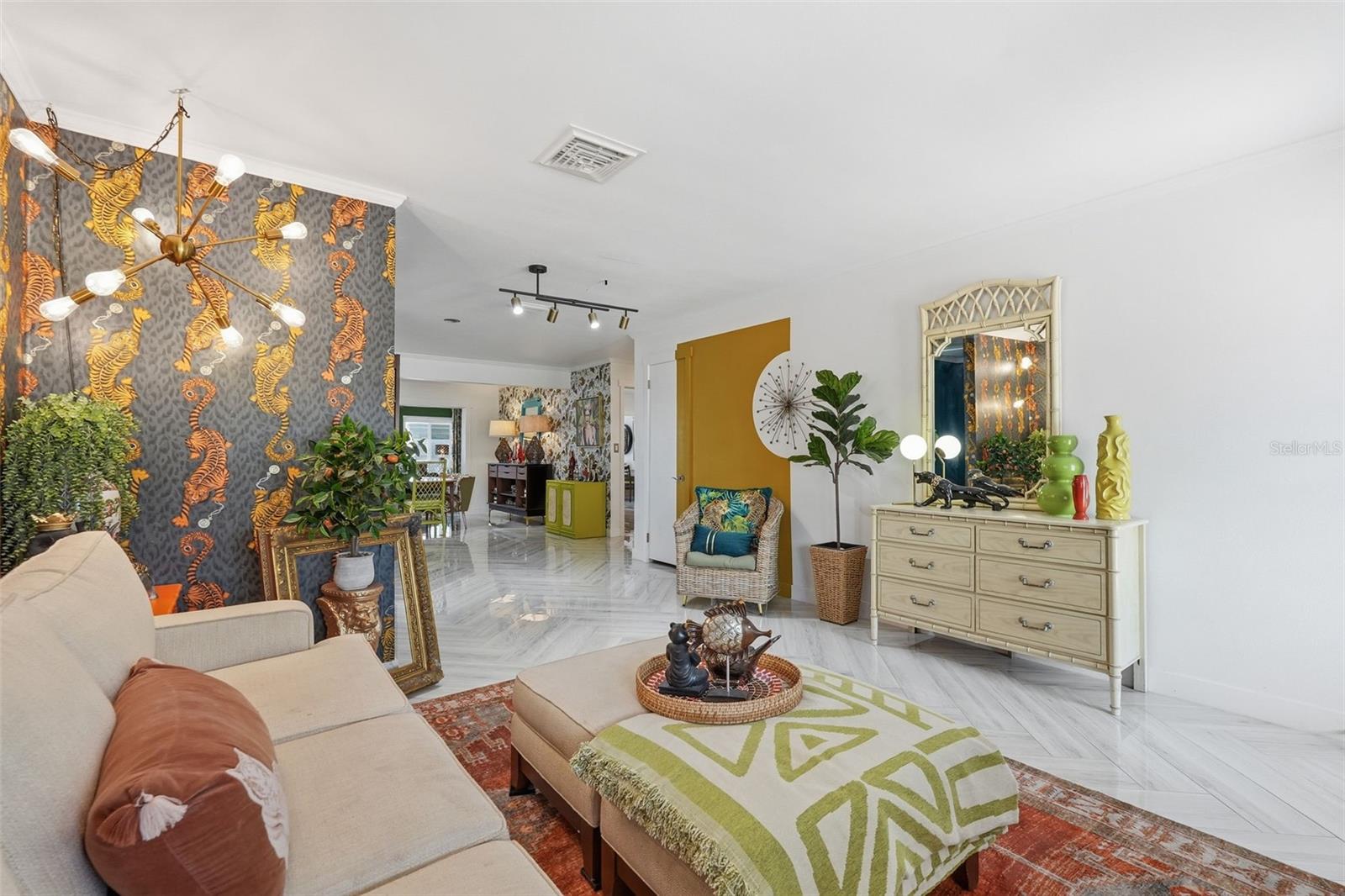 Forget beige and boring — this formal living room is a conversation piece all its own.
