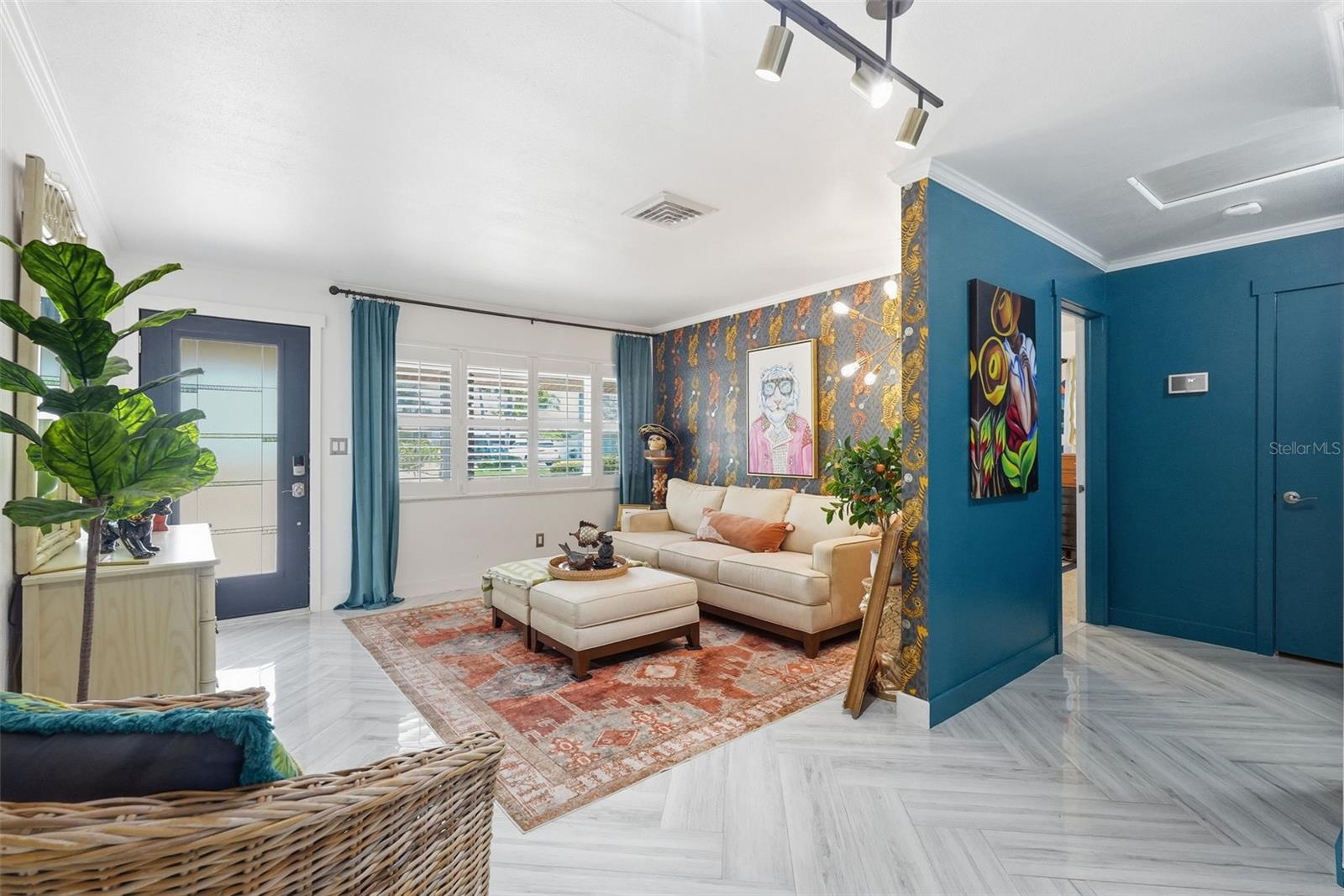 Forget beige and boring — this formal living room is a conversation piece all its own.