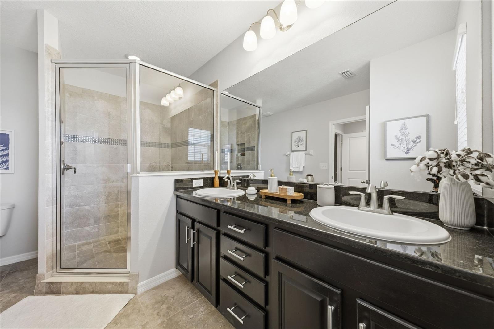 double sinks, ample counter space & large shower