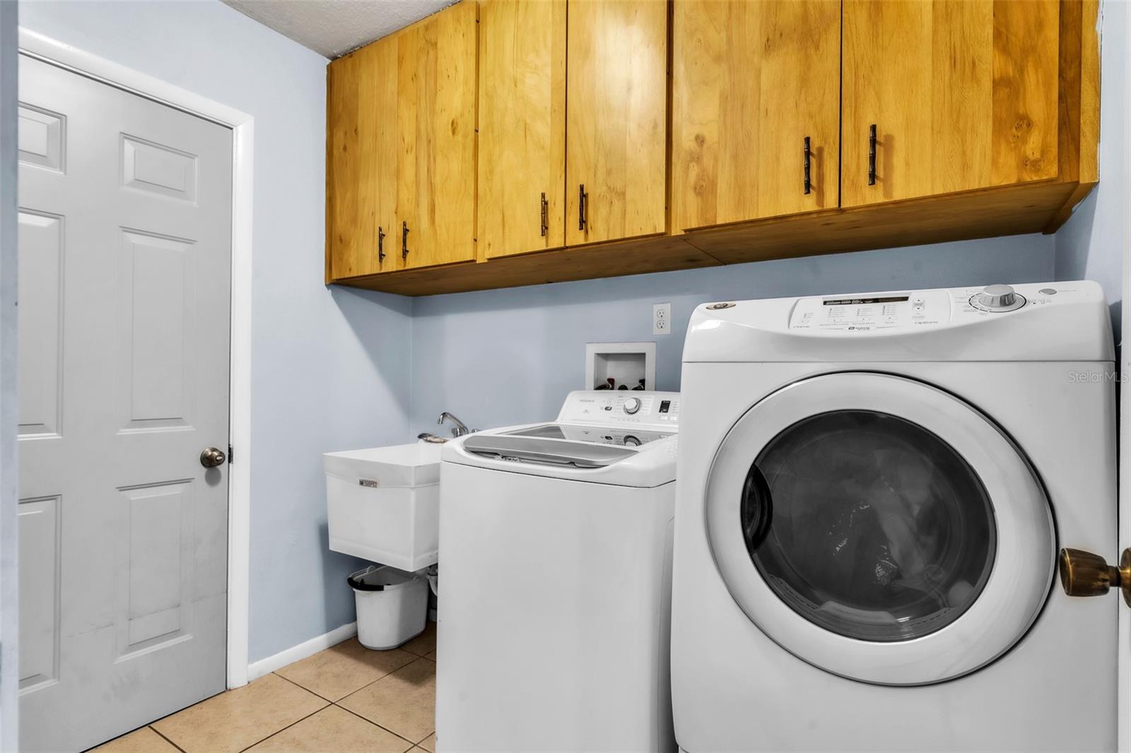 Inside laundry leads to garage