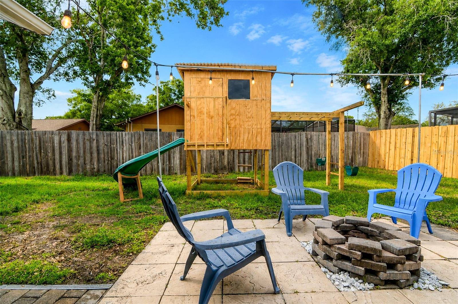 Firepit and solid wood playground set