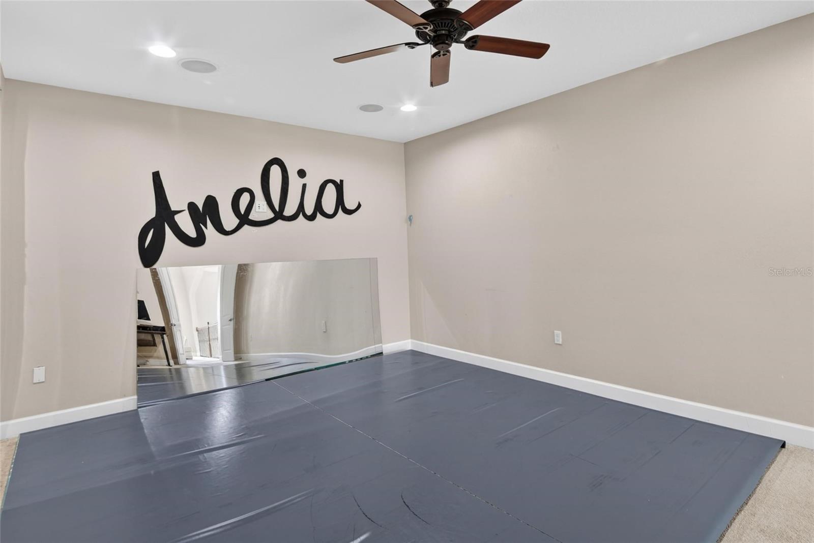 Bonus room currently used as a dance studio with wiring & speakers already in place, ideal media room, game room, or creative space