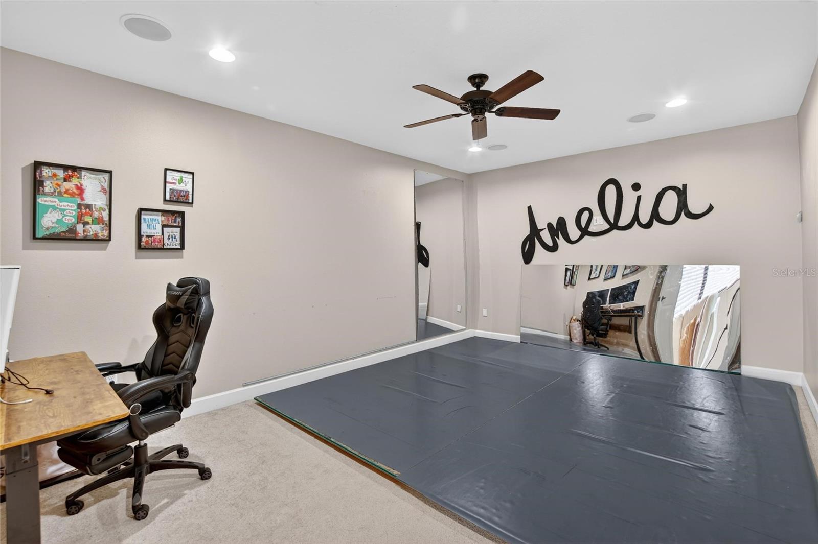 Bonus room currently used as a dance studio with wiring & speakers already in place, ideal media room, game room, or creative space