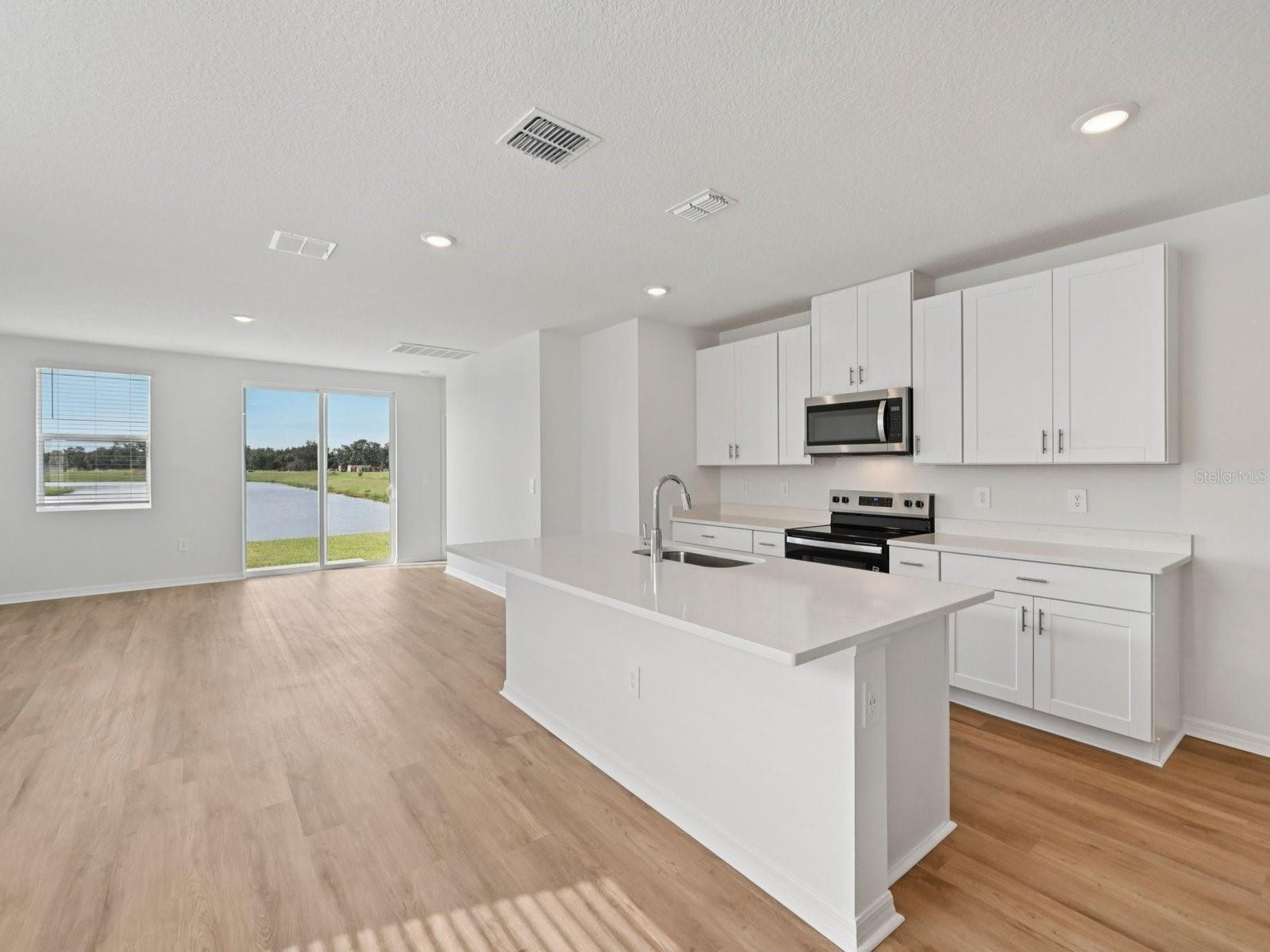 Interior photos are not of the actual home but are photos of the builder home with the same floorplan with similar interior finishes and features.