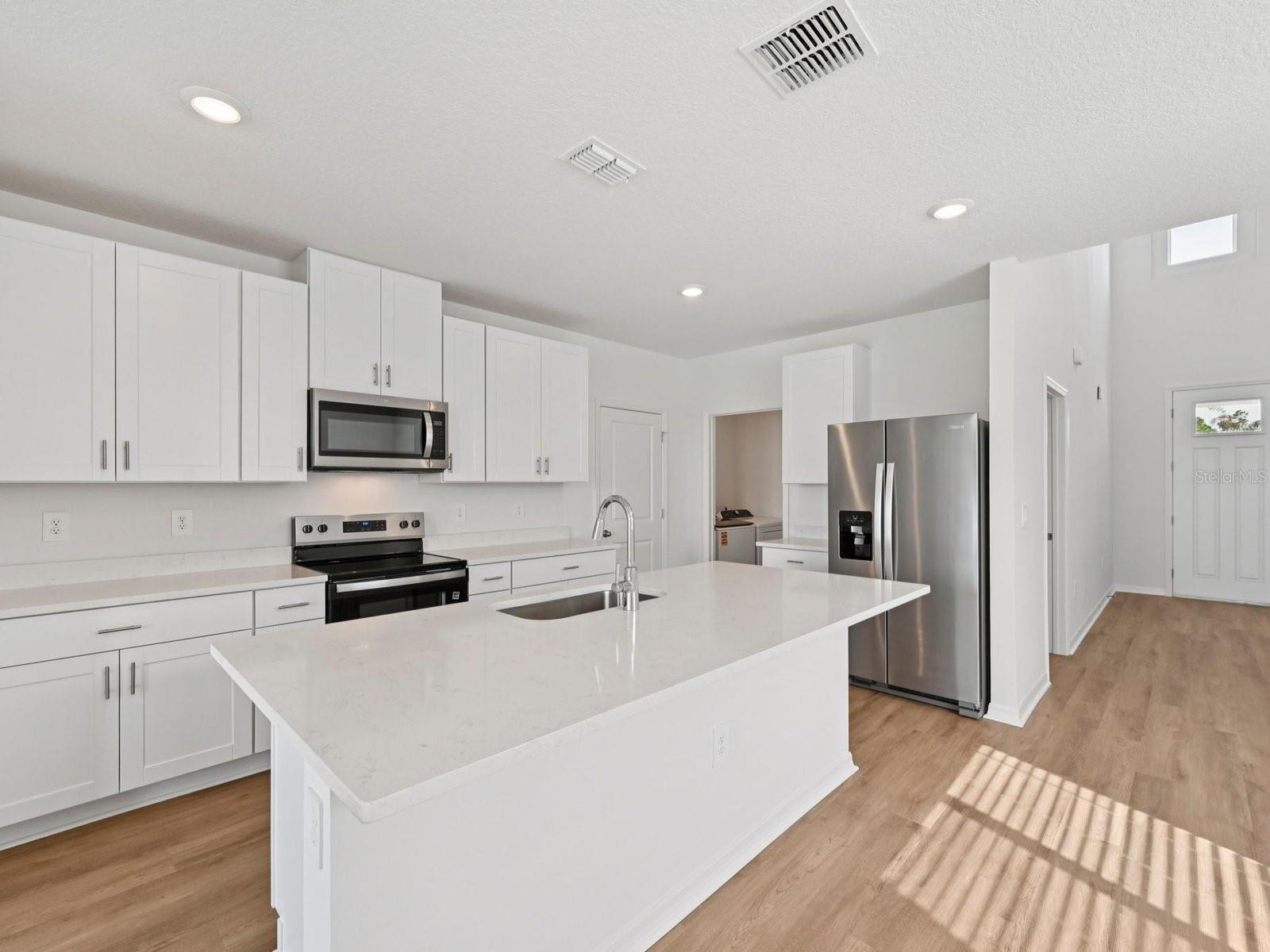 Interior photos are not of the actual home but are photos of the builder home with the same floorplan with similar interior finishes and features.