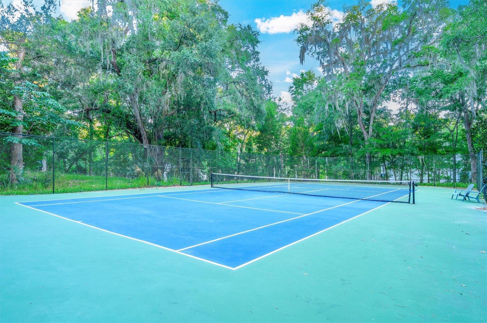 Perfect your tennis skills on your own private tennis court