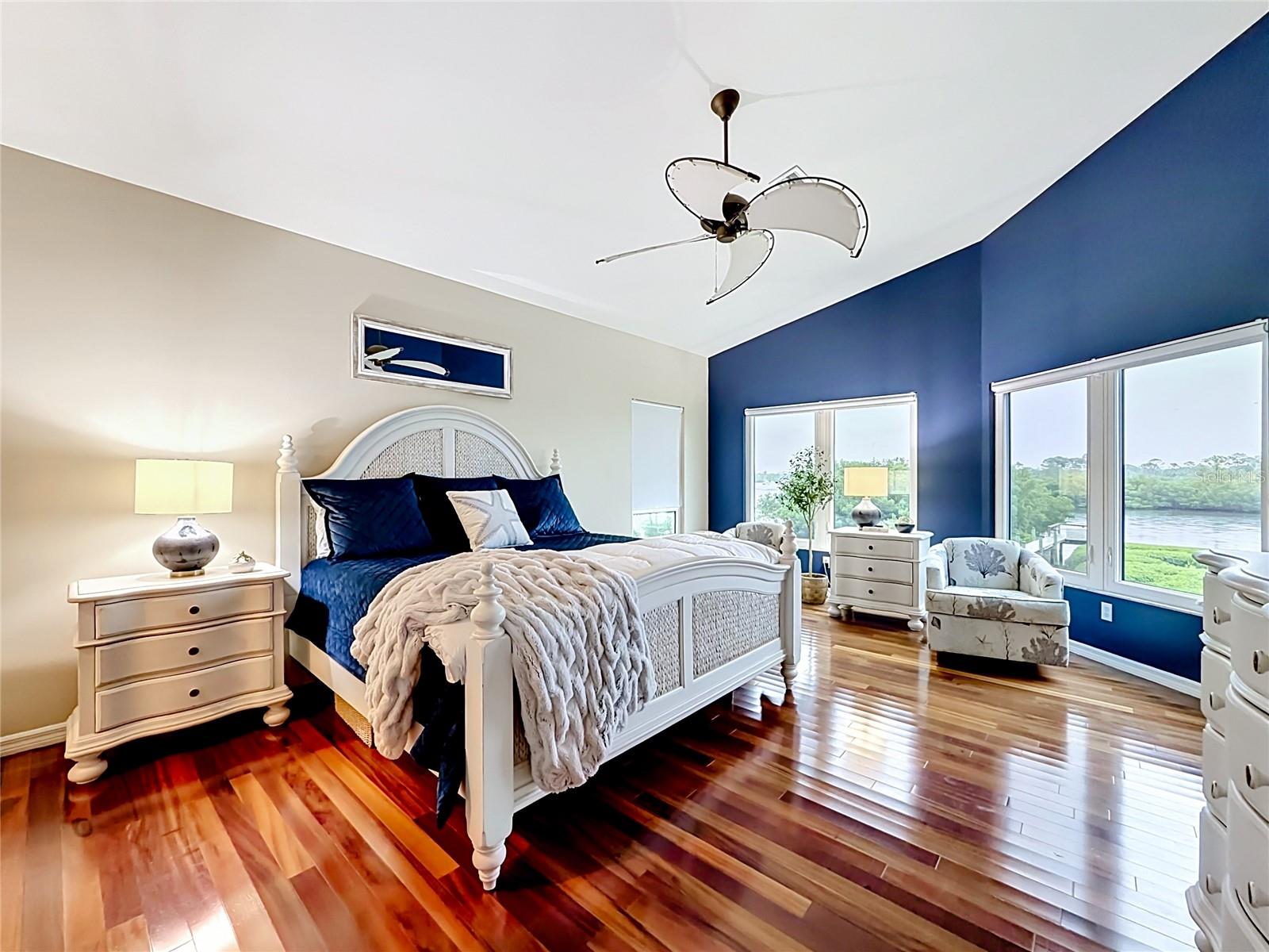 Wake up in paradise! This primary bedroom features magnificent intercoastal views that greet you each morning, making every day feel like a dream