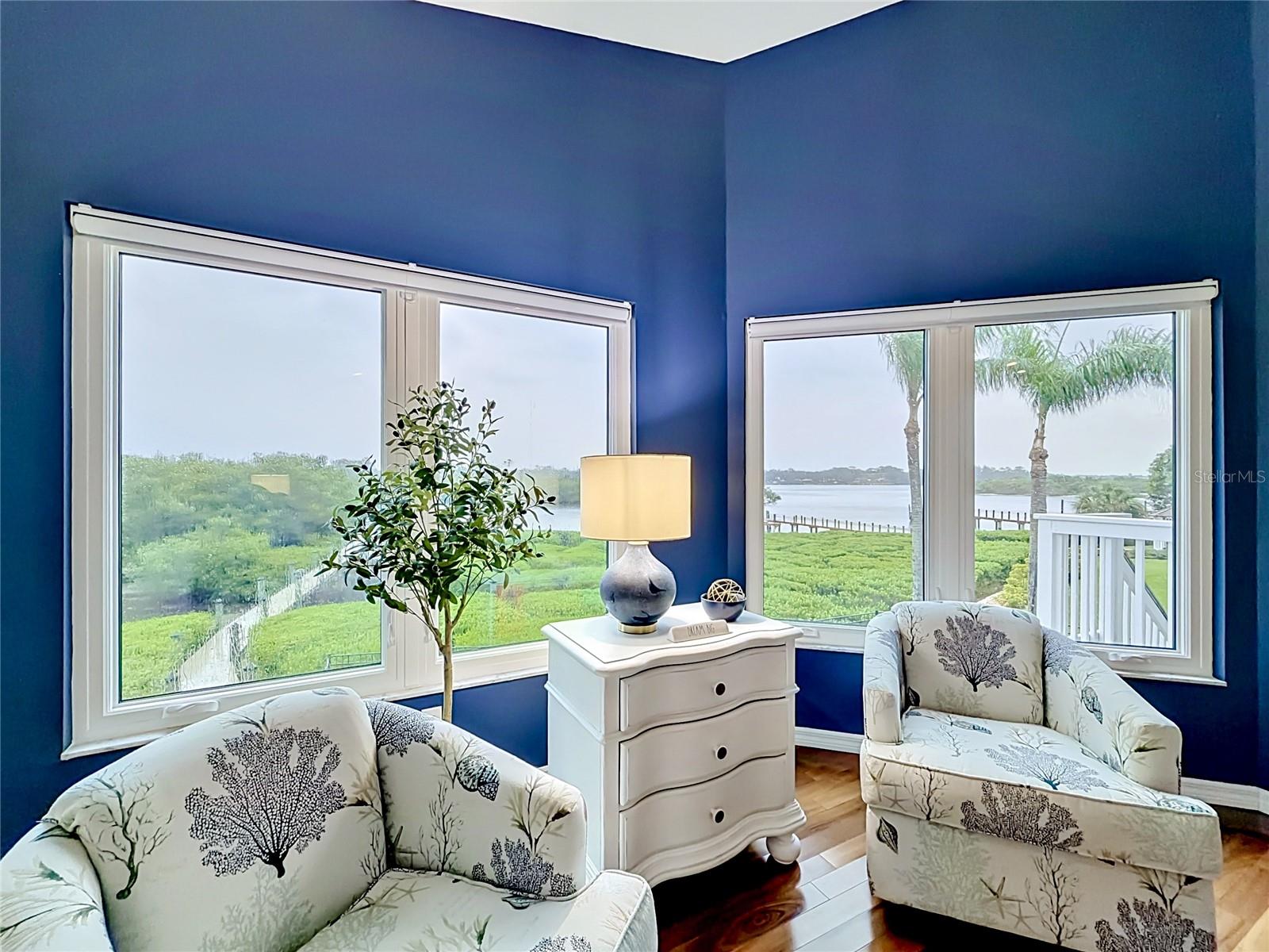 Experience unmatched tranquility in this primary suite, where fresh paint and captivating intercoastal vistas create a serene atmosphere that feels like a slice of paradise.