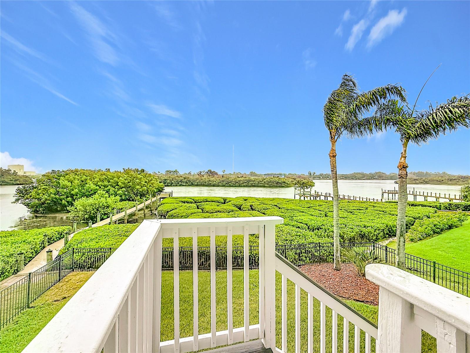 Step outside to a breathtaking view where the expansive intercoastal meets the endless sky—your gateway to serenity and waterfront bliss.