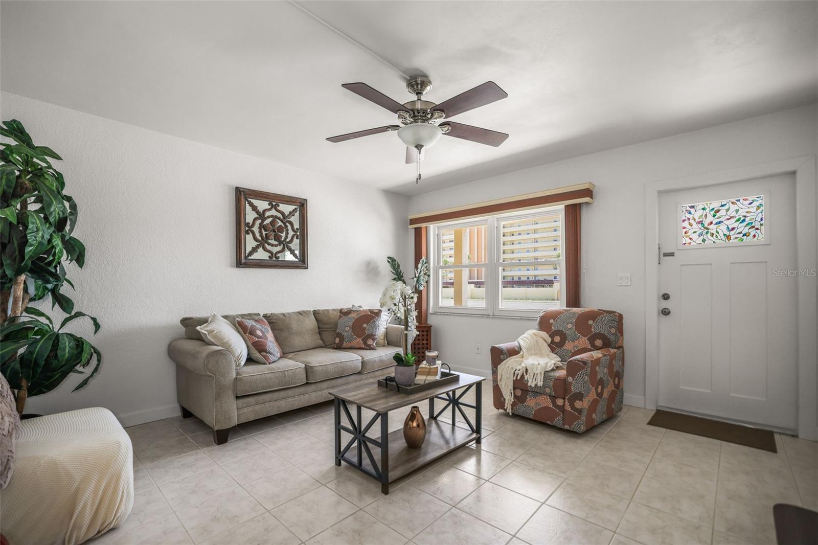 This living room is vary airy letting in the natural light
