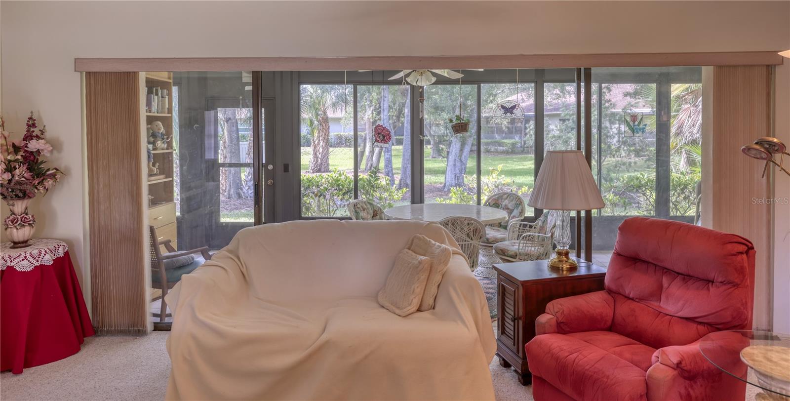 Enclosed Patio Overlooks Backyard