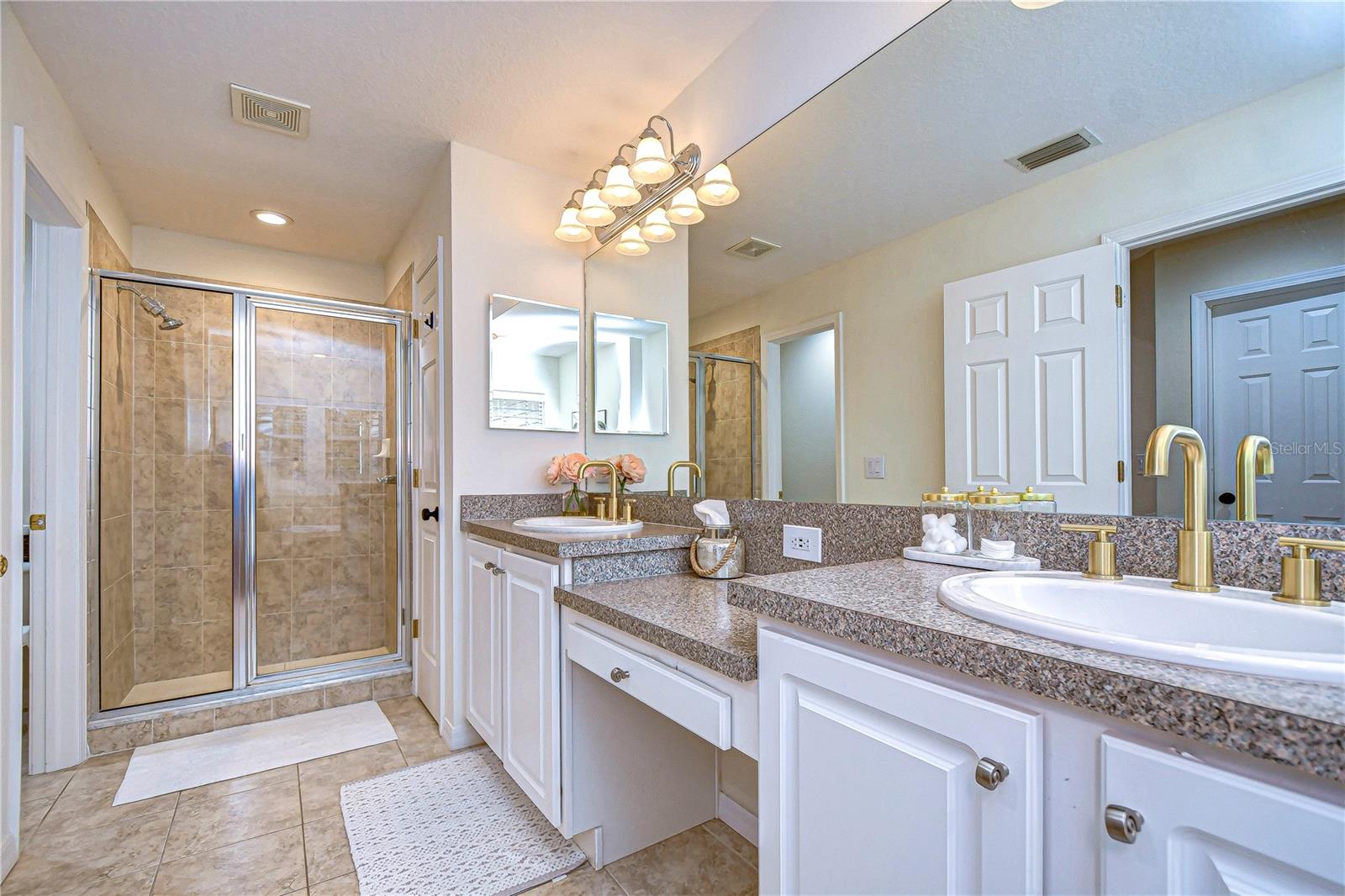 Well-appointed en-suite bath designed for relaxation.