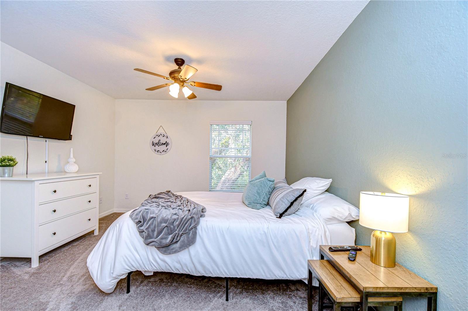 Comfortable guest or family bedroom with ample storage.