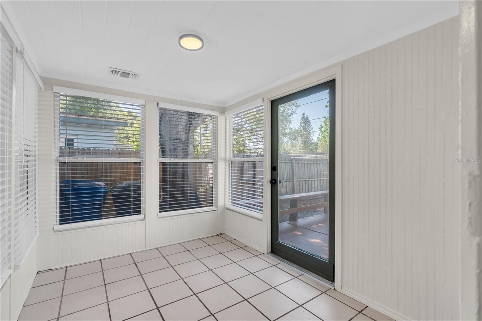 This little Florida Room is the perfect space to have morning coffee.