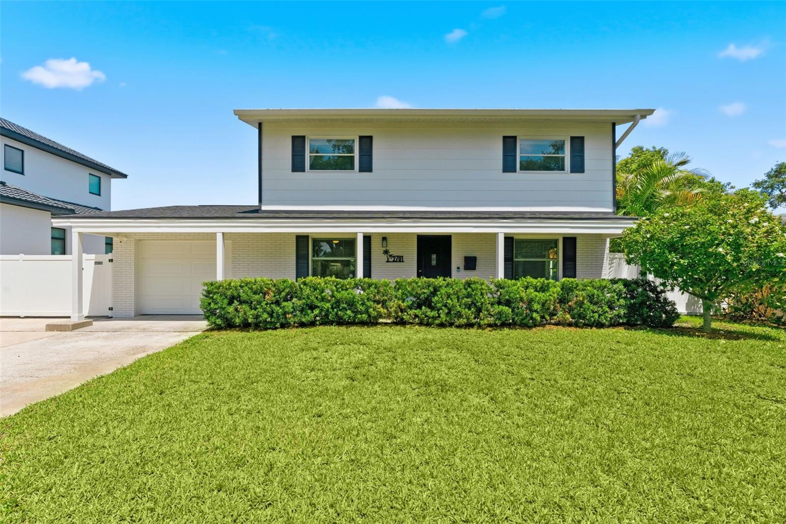 Gorgeous curb appeal greets you and your guests!