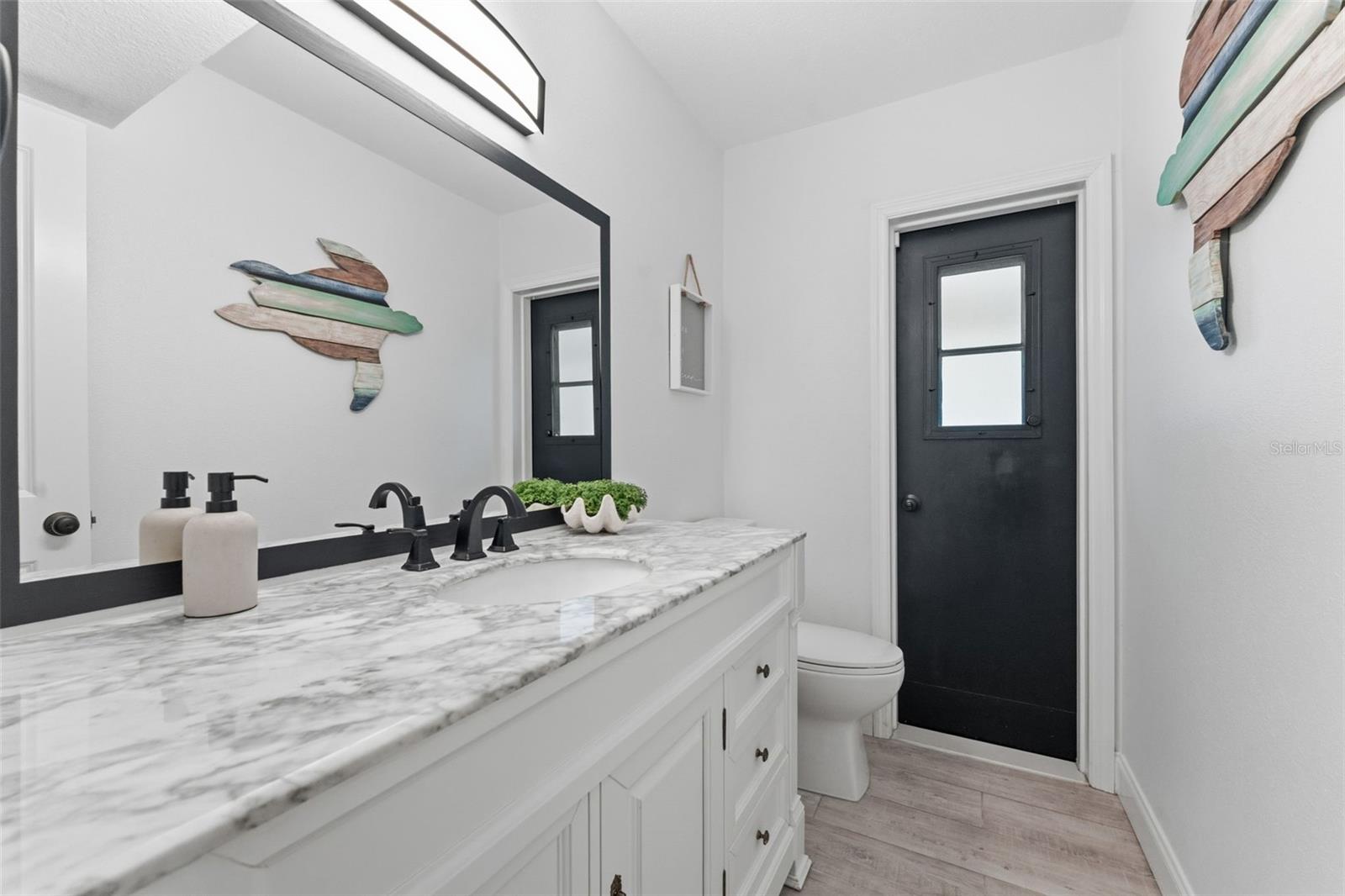 First floor half bathroom/pool bathroom