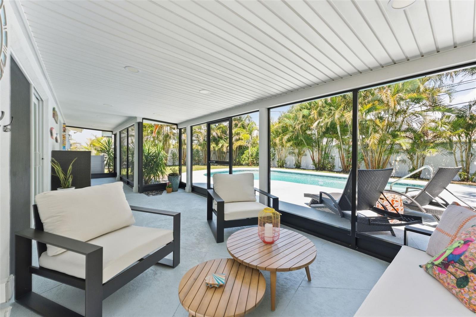 Screened-in lanai, spans the whole back of the home