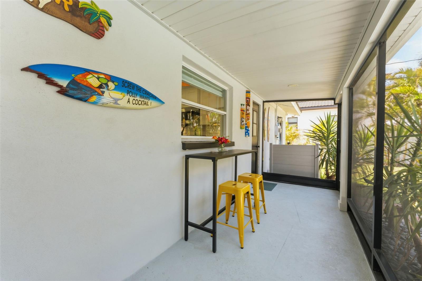 Window from the kitchen makes passing snacks and beverages through easy