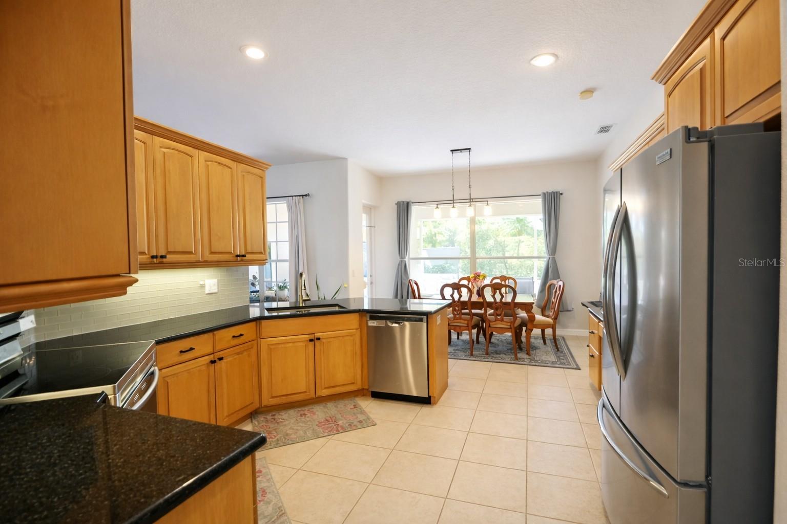 Kitchen with view of backyard
