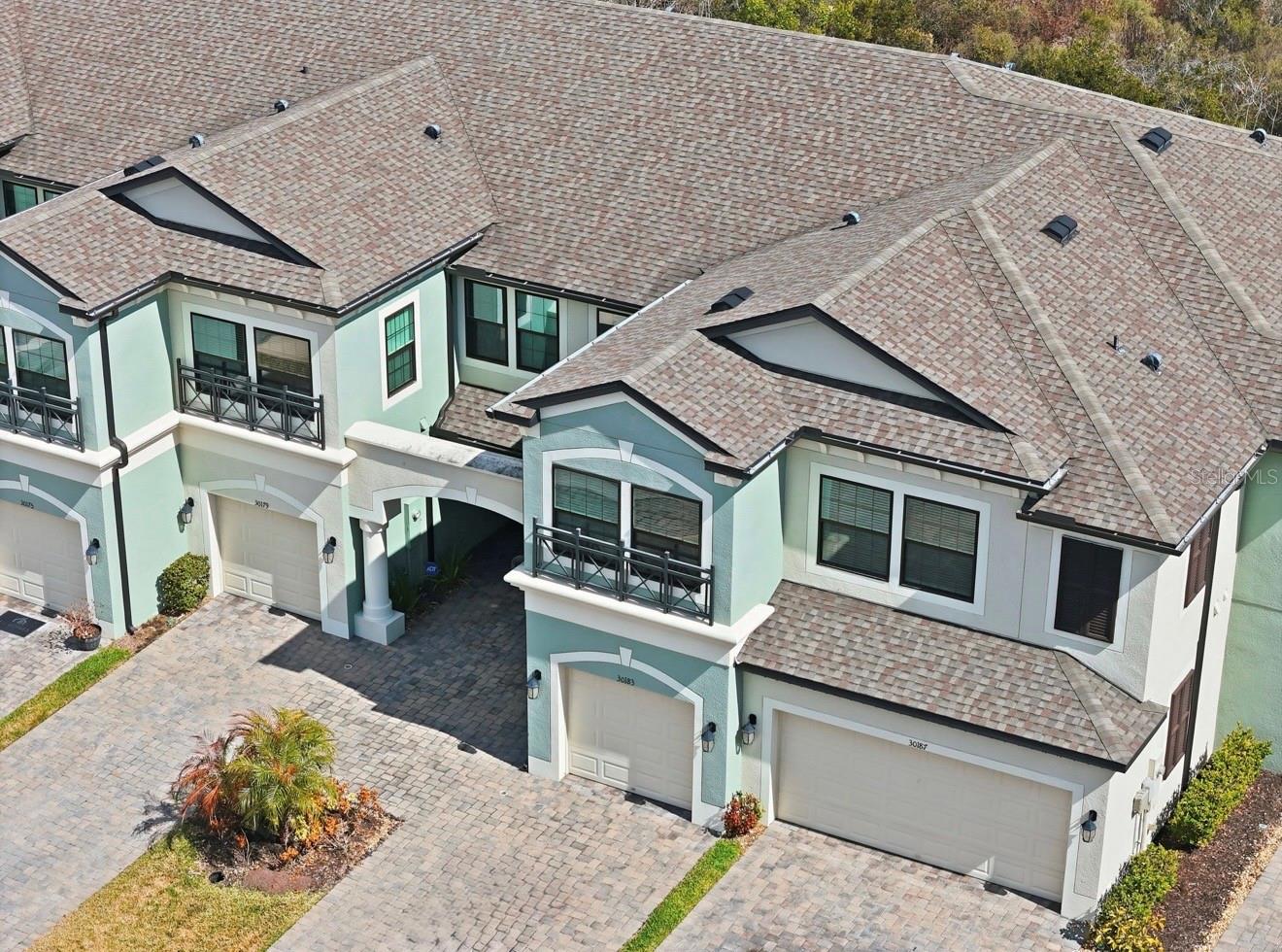 Beautiful Mediterranean Elevation - 1 car garage, driveway, plus additional parking across the street for guests