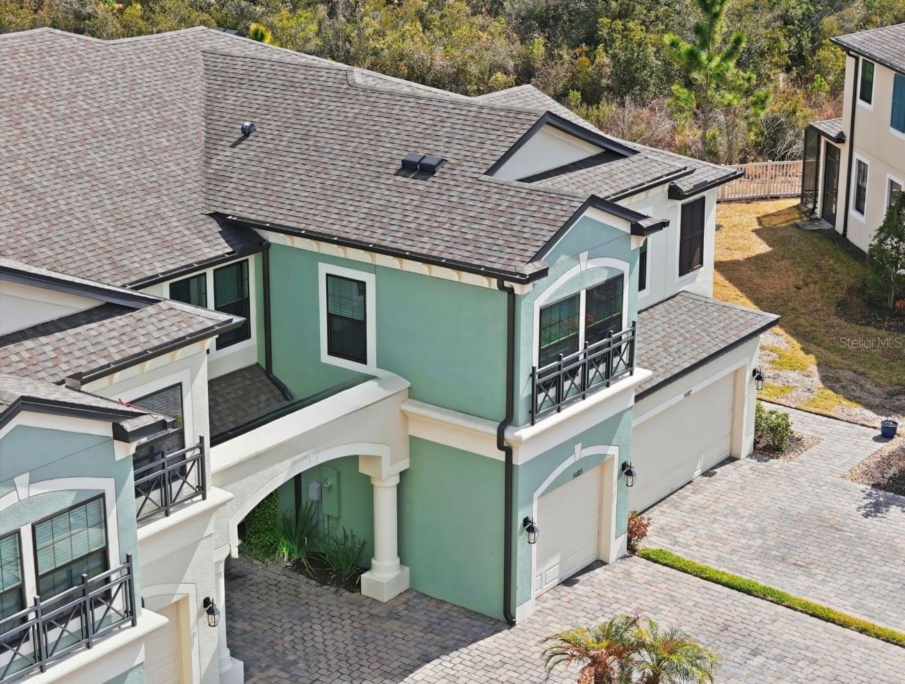 Beautiful Mediterranean Elevation - 1 car garage, driveway, plus additional parking across the street for guests