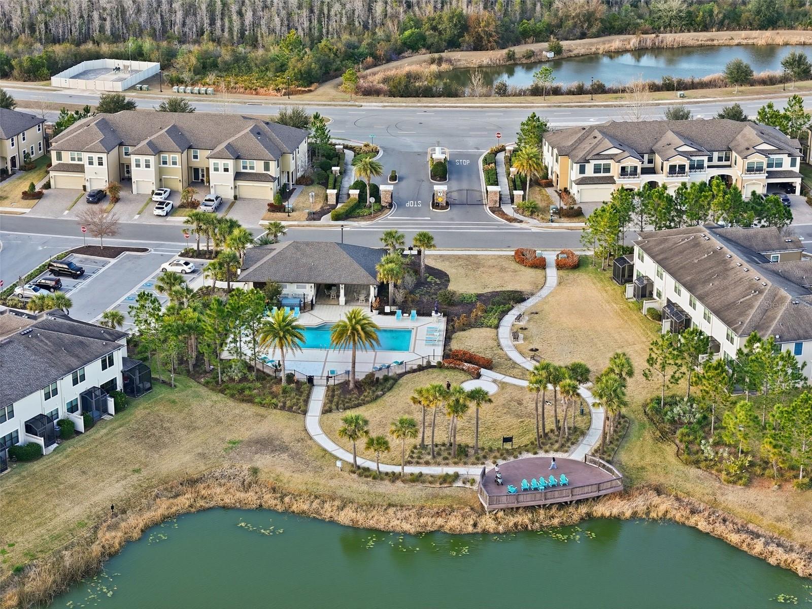 Gated community with beautiful pool and lounging dock