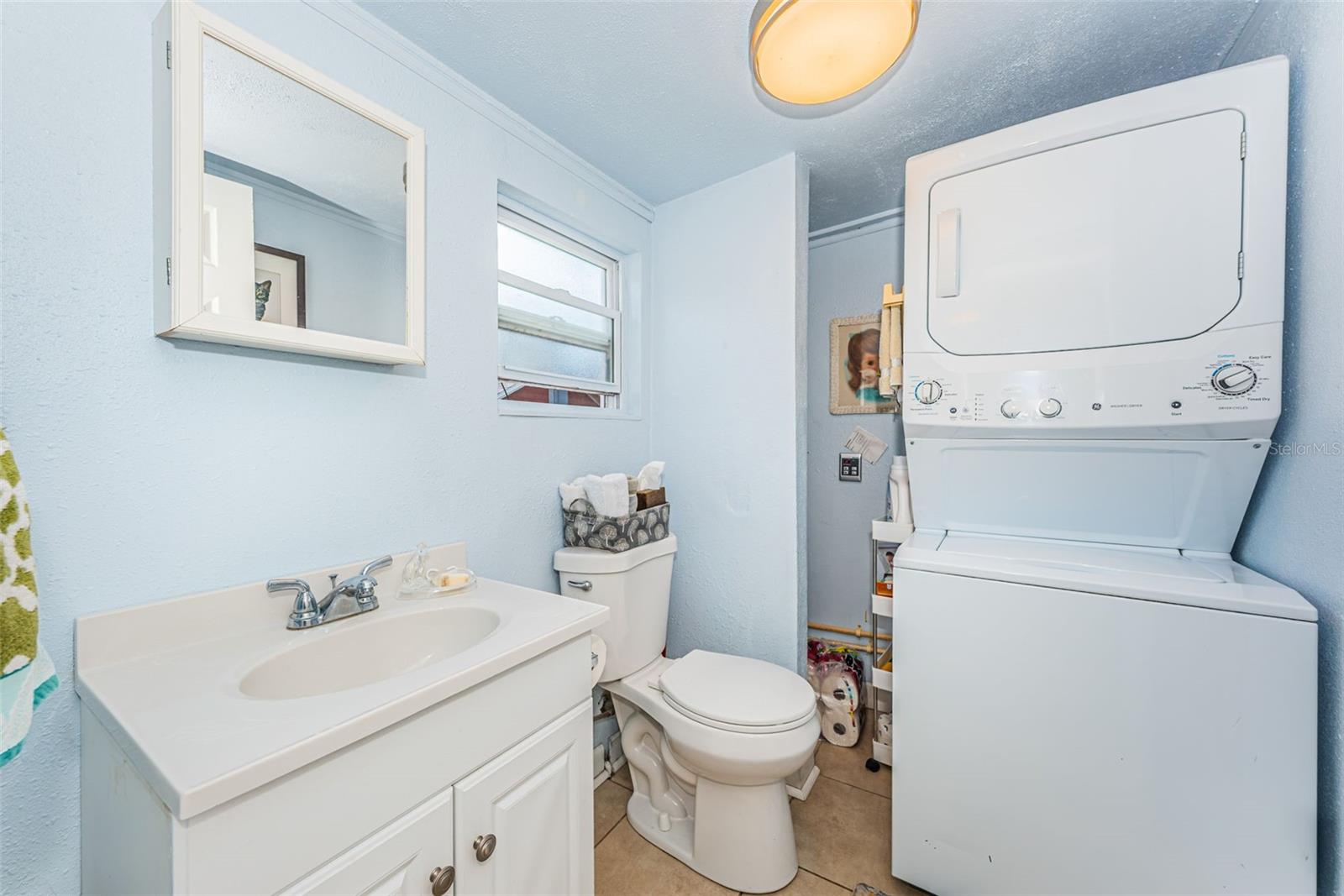 Half bathroom with laundry